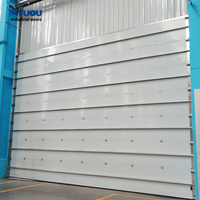 Almacén de fábrica logístico automático y puerta de elevación vertical de acero seccional industrial de fácil operación