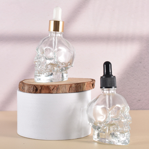 High Quality 50ml 1.5oz Exquisite <strong>Skull</strong> <strong>Glass</strong> <strong>Bottle</strong> With Gold Sliver Dropper for Personal Care - Product Image 3