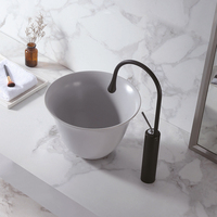 Vasque de salle de bain ronde moderne et minimaliste à poser, en porcelaine artistique, pour salles de bain contemporaines