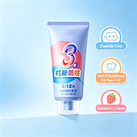 Dentifrice OEM sans fluorure pour enfants, anti-caries, nettoyage en profondeur, saveur fraise, blanchissant, sûr à avaler, usage domestique, directement de l'usine