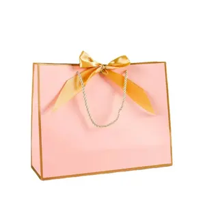 生日婚礼礼品派对哑光粉色礼品纸购物袋带丝带领结
