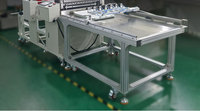 Machine de découpe automatique rouleau-à-feuille 2000W 700mm avec bras robotisé et alimentation par pince de traction