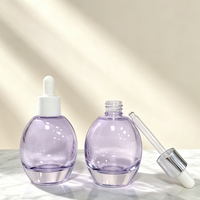 En stock, flacon compte-gouttes rond en verre de 50 ml, flacon de recharge pour sérum d'huile essentielle pour le visage