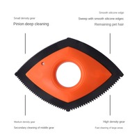 Brosse multifonctionnelle pour l'épilation des animaux de compagnie Brosse à poils de chat en acier inoxydable et en silicone et peignes pour le nettoyage des tapis.