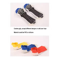 Chaussettes de football supérieures antidérapantes en stock Chaussettes de football à la cheville de haute qualité Chaussettes de sport antidérapantes