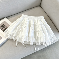 Robe d'été 2026 style ballet, jupe courte bouffante en dentelle à volants et nœud, coupe trapèze féminine et amincissante