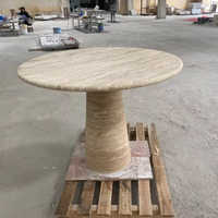 Table console en pierre naturelle travertin, design rond unique, style moderne traditionnel, taille personnalisable pour la salle à manger d'hôtel