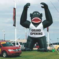 Gorille gonflable géant en PVC, figurine de singe de dessin animé avec slogan personnalisé pour la décoration d'événements commerciaux ou d'inaugurations