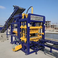 Machine à fabriquer des briques en béton QT4-15s entièrement automatique pour les ateliers de matériaux de construction avec une surface de plancher de 2000 à 8000 m²