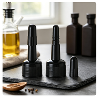 Bouchon à vis en plastique noir de 20 mm avec embout long et couvercle de protection amovible pour l'emballage de bouteilles de liquide