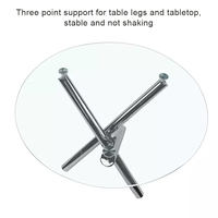 Table à manger ronde contemporaine en verre trempé avec pieds en métal, mobilier écologique pour hôtels et villas, vente en gros