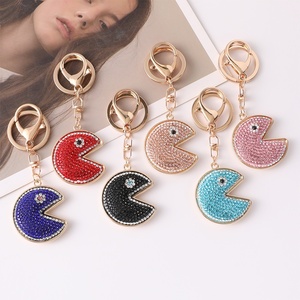 Porte-clés pendentif de sac pour couple <span class=keywords><strong>Pac</strong></span>-<span class=keywords><strong>Man</strong></span> en alliage de zinc incrusté de diamants, style <span class=keywords><strong>dessin</strong></span> <span class=keywords><strong>animé</strong></span>, mignon, euro-américain, cadeau, vente en gros - Product Image 1