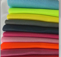 Tissu en maille hexagonale 3D en polyester 100% tricoté doré