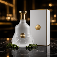 Bouteille gaufrée 700 ml en verre super flint avec logo couleur personnalisé pour spiritueux, whisky, liqueur, acceptant l'emballage personnalisable, vente en gros directe usine