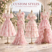 Robe de soirée formelle personnalisée pour femme en organza à imprimé floral, avec corset, bretelles à nœuds, volants superposés et jupe asymétrique