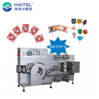 Machine de production et d'emballage de petits bonbons plats à la sucette commerciale entièrement automatique