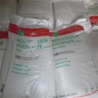 Lot de granulés et poudre style monocristallin de phosphore tunique MCP 22.3% 22.7%, qualité complémentaire à aliments pour animaux