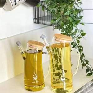 โรงงานขายส่งขวดน้ำมัน/น้ำส้มสายชูแก้วปลอดสารตะกั่ว พร้อมฝาไม้และหูจับ สไตล์โมเดิร์นหรูหรา รับทำโลโก้ตามสั่ง - Product Image 4