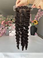 Vente en gros de vrais cheveux humains vierges 5x5 fermeture de base en soie doux brun foncé Topper birman bouclé 4C délié noué à la main trame femmes