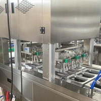 Machine automatique de remplissage et de scellage continue de barquettes en aluminium pour la restauration rapide, les fruits de mer, les boissons, le riz, les gobelets et les contenants