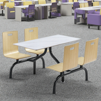 Moderne Restaurantmöbel Esstisch und 4 Stühle Set mit Marmorplatte Metallrahmen Wasserdicht & Langlebig