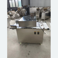 Machine à diviser et à arrondir la pâte pour un travail continu, machine à couper et à arrondir la pâte pour boulangerie
