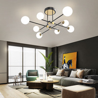 Lampe suspendue LED en fer de style nordique contemporain post-moderne de luxe, type « Magic Bean », pour chambre principale et salon, lumière chaude