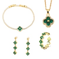 Ensemble de bijoux transfrontalier en cuivre, zircon et trèfle à quatre feuilles, style mode luxe léger, élégant et sophistiqué, comprenant bracelet, boucles d'oreilles, bague et collier