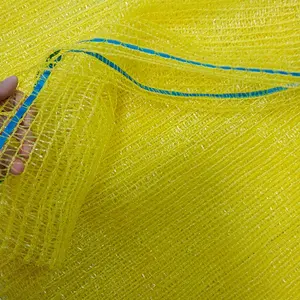 Pabrik langsung Tiongkok 20 kg kuning 40x60 tas jaring Raschel untuk kemasan kentang bawang buah jeruk lemon
