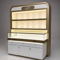Vitrine à bijoux haut de gamme avec dessus incurvé, verrouillable, en verre, avec tiroir et armoire de rangement