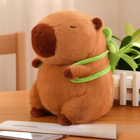 Peluche Capybara Doux et Cuddly avec Sac à Dos et Oreiller pour Décoration d'Intérieur et Porte-clés Anti-stress