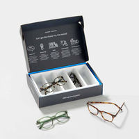 Boîte d'expédition de luxe noire et argentée avec logo et séparateur intérieur pour l'emballage de bouteilles en verre, de parfums et de lunettes de soleil