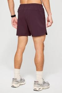 กางเกงขาสั้นออกกำลังกายผู้ชายแบบ 2 in 1 ผ้าระบายอากาศดี มีซับใน พร้อมโลโก้สั่งทำได้ ขายส่ง กางเกงฟิตเนสเพาะกาย กางเกงออกกำลังกายมีกระเป๋า กางเกงไนลอน - Product Image 3