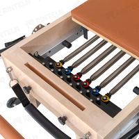 Machine de Pilates et de yoga multifonctionnelle portable en bois d'érable avec jambes rétractables pour studios de Pilates professionnels