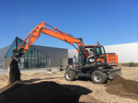 Excavatrice sur roues professionnelle DX160W pour les travaux municipaux, l'installation de canalisations, les travaux routiers et les travaux civils généraux