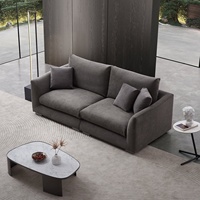 Canapé modulaire de bureau en tissu gris italien, style minimaliste, confort nuageux