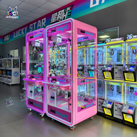 En gros, Machine à griffes à monnayeur Naughty Dog pour jeux d'enfants, avec jouets en peluche et poupées, rose transparente, pour arcade, 110V/220V, Version anglaise pour magasins