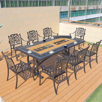 Ensemble table et chaises de jardin européennes modernes en carbone pour l'extérieur, idéal pour les repas et les barbecues en cour.