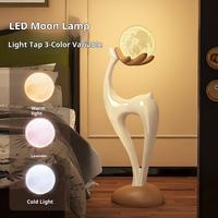 Lampe de table créative en résine en forme de cerf, lumière lunaire moderne de luxe, éclairage d'ambiance décoratif pour chambre à coucher et salon