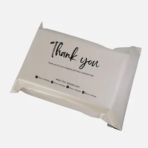 Ropa de papel DHL logotipo personalizado envío express vestido bolsas de embalaje respetuosas con el medio ambiente personalizadas para ropa