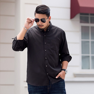 เสื้อเชิ้ตลำลองทรงหลวมสำหรับผู้ชายไซส์ใหญ่ แขนยาว สีพื้น สำหรับใส่ทำงาน - Product Image 1