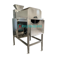 Machine de séparation de la pulpe, des pépins et des peaux de jus de fruit de la passion