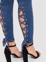 Jean taille haute européen et américain en jean stretch déchiré à œillets