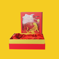 STPP a développé une boîte cadeau de luxe en papier 3D personnalisée avec impression, pour whisky/cognac, avec insert en mousse en forme de bouteille.