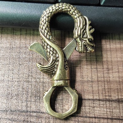 Porte-clés tête de dragon rétro