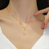 Nouvel ensemble de bijoux trèfle à quatre feuilles porte-bonheur 2026 entièrement pavé de zircons, collier et boucles d'oreilles en acier inoxydable anti-ternissement, cadeau pour femmes