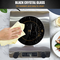 Les appareils ménagers familiaux portables 220V 2000W utilisent une cuisinière à induction électrique