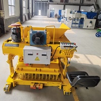 Machine automatique de fabrication de blocs de béton mobiles PLC avec vibration hydraulique pour l'industrie de la construction