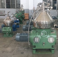 Centrifugeuse à disques à décharge automatique haute efficacité pour l'extraction de lanoline et le traitement de la graisse de laine