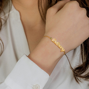 Bán Buôn Tùy Chỉnh Đơn Giản Tự Làm Miễn Phí Kết Hợp Các Chữ Cái Và Số Thép Không Gỉ Mạ Vàng Có Thể Điều Chỉnh Vòng Đeo Tay - Product Image 1